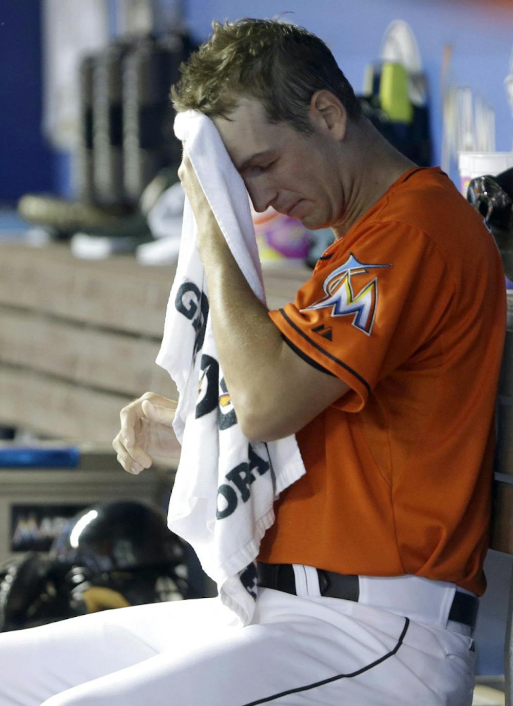 <p>Miami Marlins starting pitcher Jacob Turner wipes his brow during the first inning of a 6-5 loss against the New York Mets on Monday in Miami.</p>