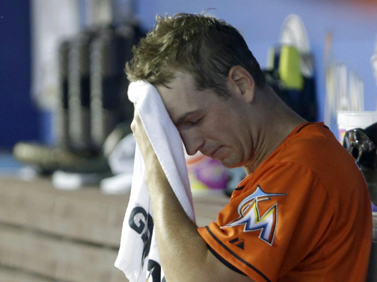 Miami Marlins starting pitcher Jacob Turner wipes his brow during the first inning of a 6-5 loss against the New York Mets on Monday in Miami.