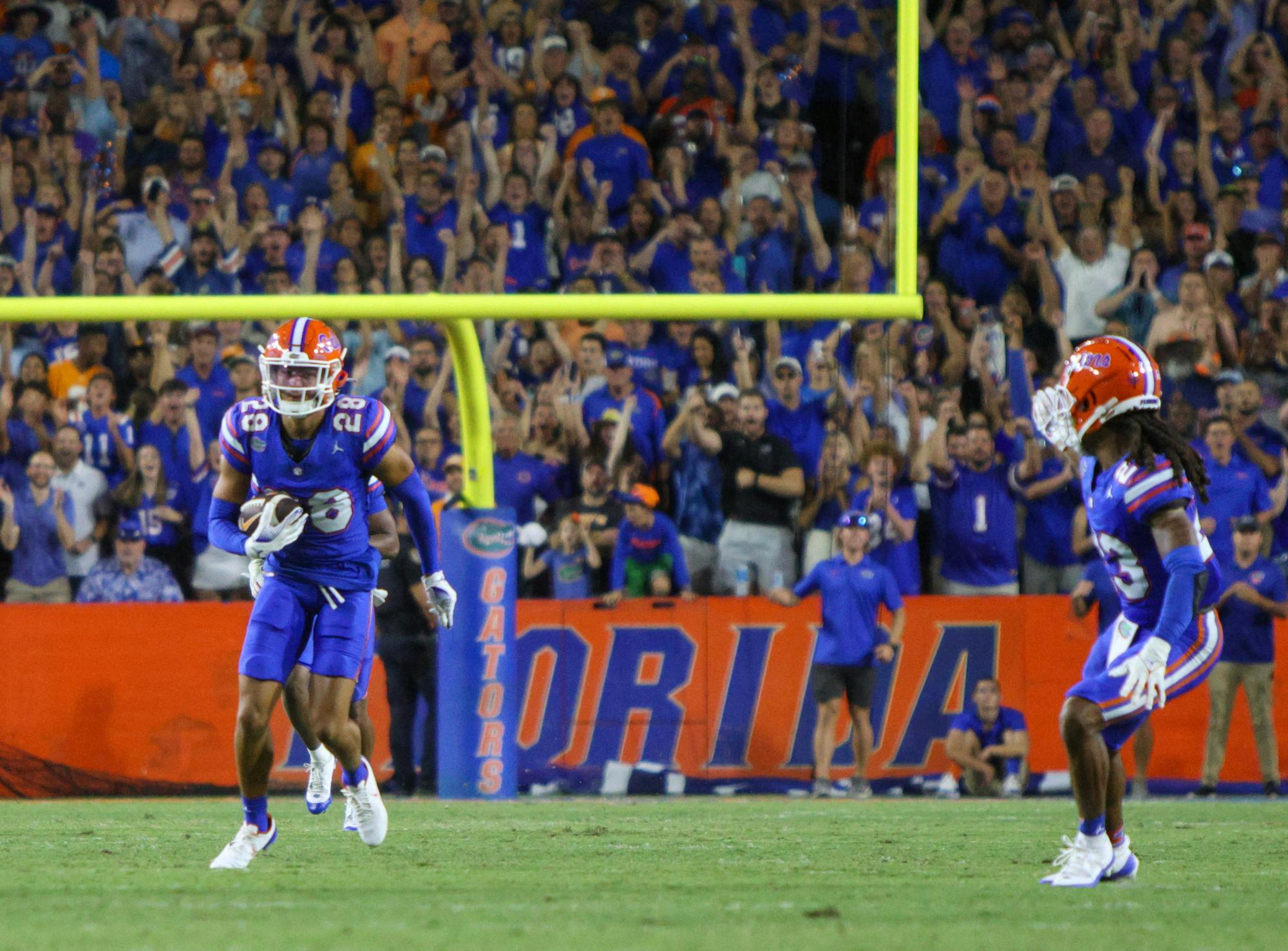 Sophomore cornerback Devin Moore returns his first career interception in the Gators' 29-16 win against the Tennessee Volunteers Saturday, Sept. 16, 2023.