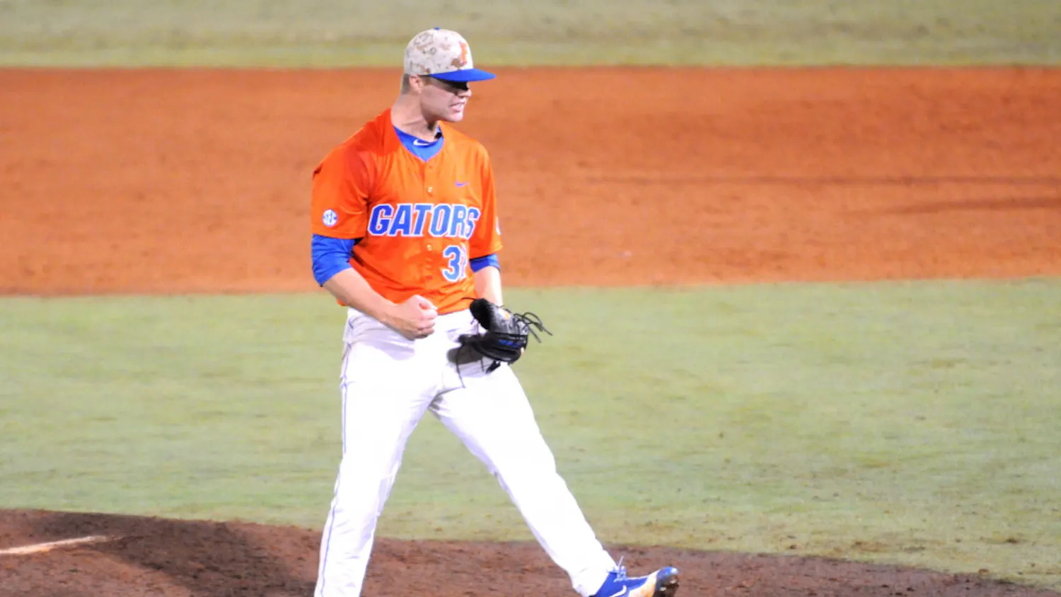 Logan Shore celebrates after throwing a complete-game shutout -- his school-record 13th consecutive win -- during Florida's 6-0 win against Georgia on April 22, 2016, at McKethan Stadium.