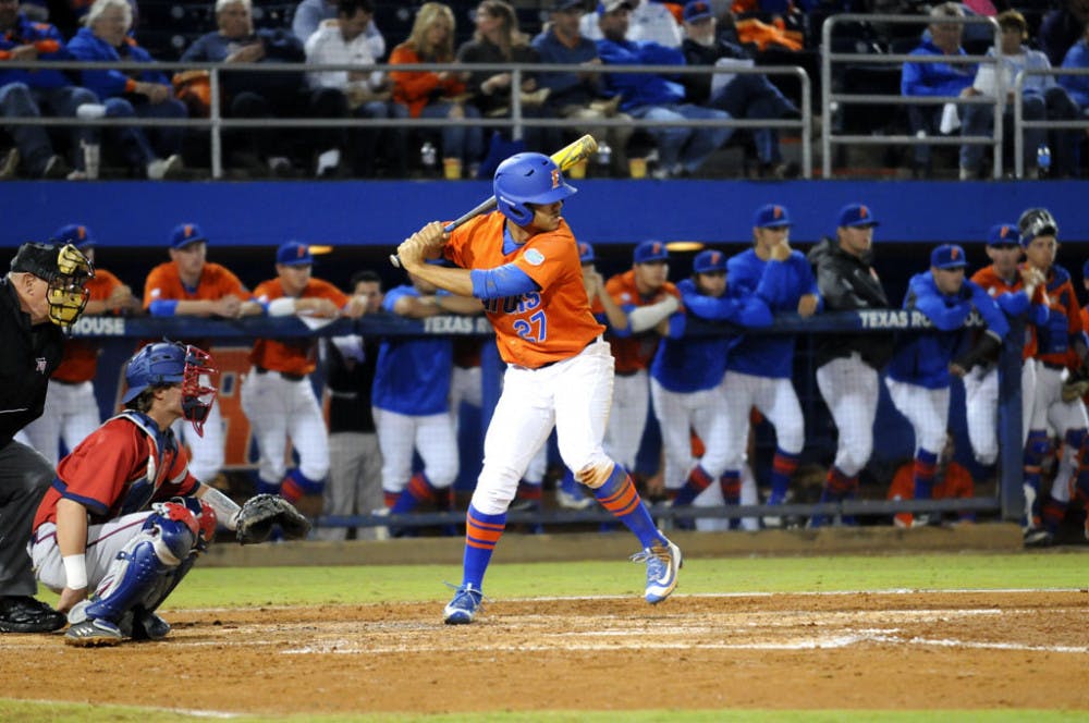 Nelson Maldonado bats during Florida's 2-1 win over Florida Atlantic on March 22, 2016, at McKethan Stadium.