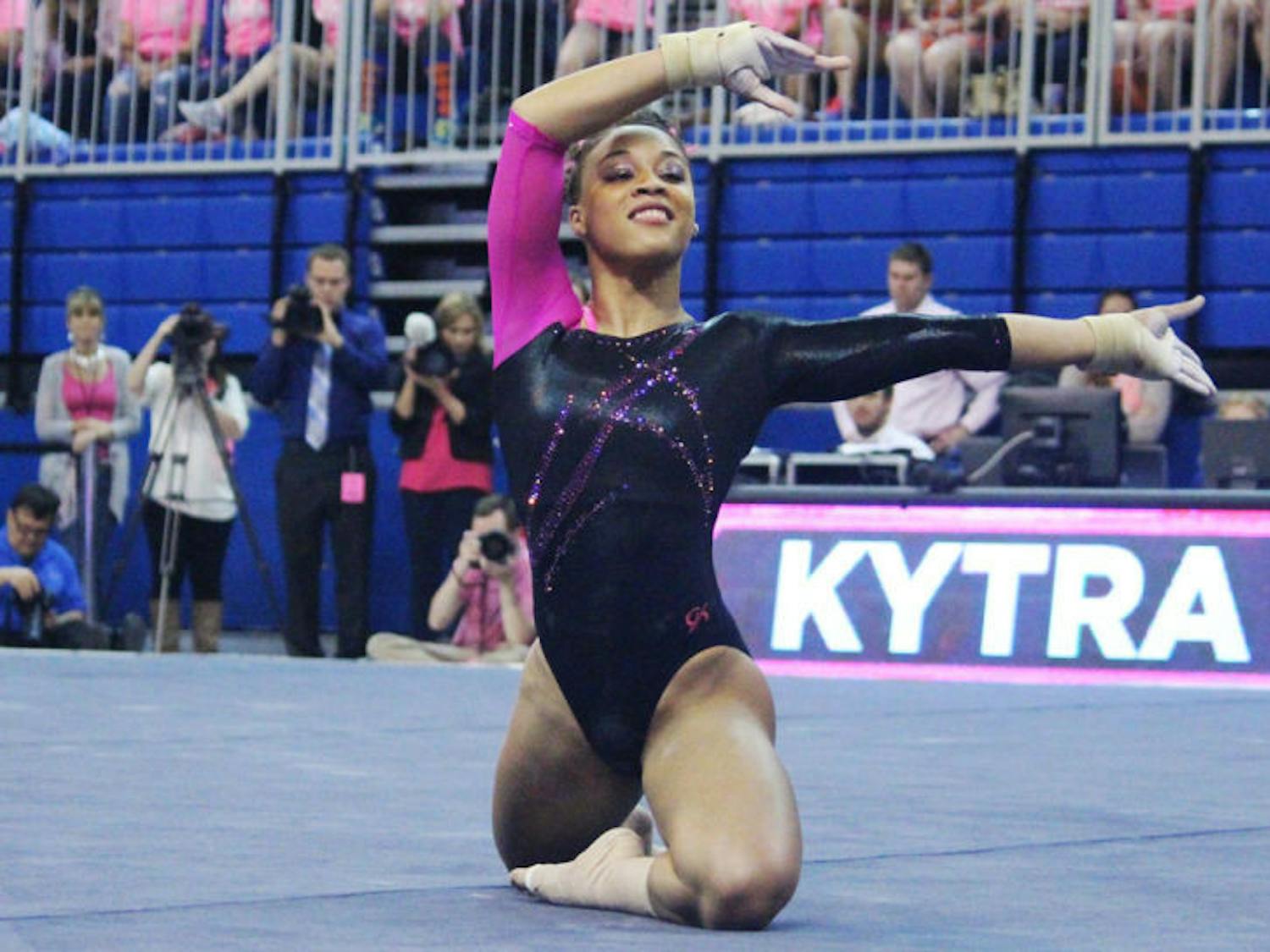 Kytra Hunter performs a floor routine during Florida’s 198.125-197.625 win against LSU on Feb. 21 in the O’Connell Center. Hunter landed six perfect scores (four on floor and two on vault) during the 2014 season.