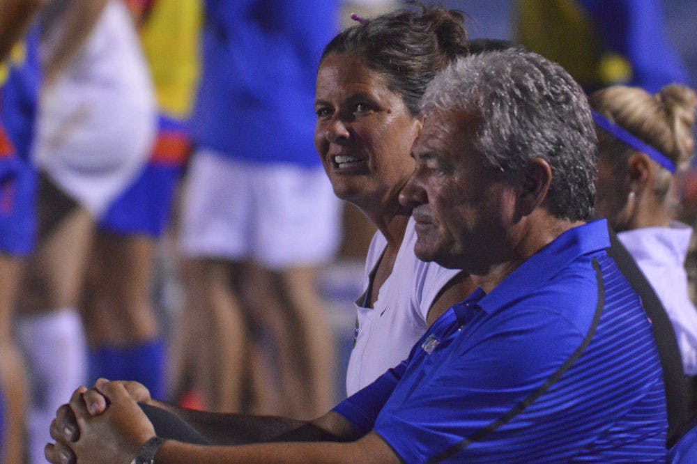 UF coach Becky Burleigh looks down the field during Florida's season-opening win against Miami on Aug. 24, 2014.