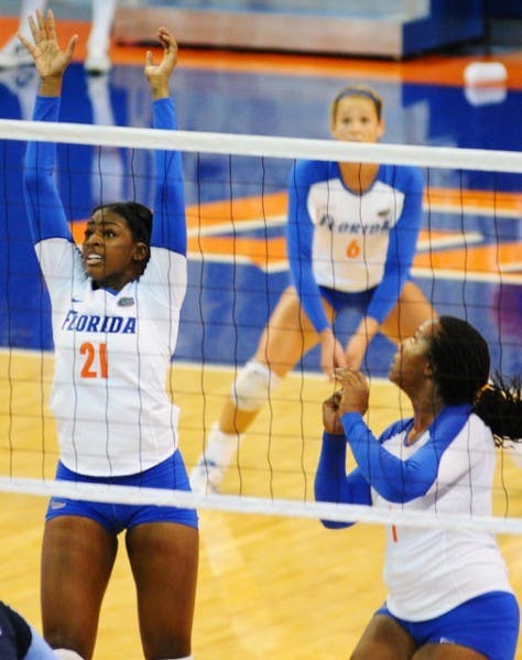 Gators middle blocker Cassandra Anderson (21) is second on the team in blocks, but coach Mary Wise said Florida wants to get her more involved against Auburn tonight at 8.