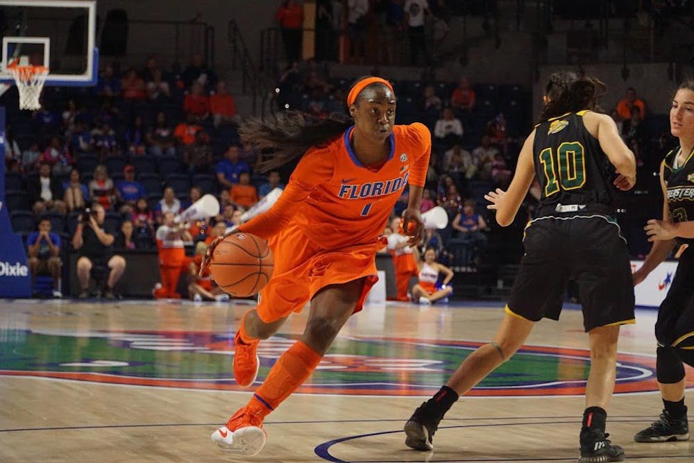 <p>UF forward Ronni Williams dribbles the ball during Florida's 102-51 win over Southeastern Louisiana on Dec. 28, 2016, in the O'Connell Center.&nbsp;</p>