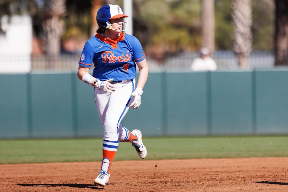 Florida catcher Jocelyn Erickson (8) runs to third base during an NCAA softball game against Lindenwood, Saturday, Feb. 21, 2026, in Gainesville, Fla.