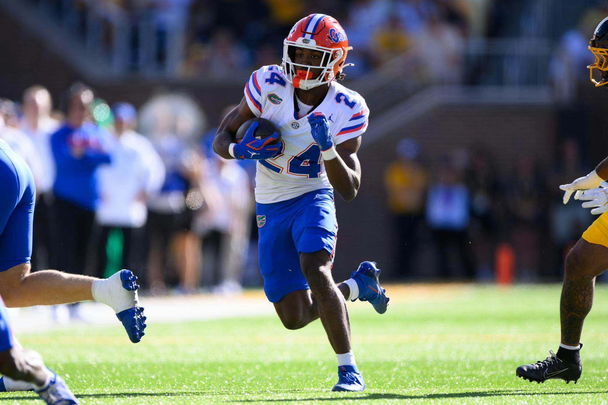 Florida running back London Montgomery (24) rushes during the first half of an NCAA college football game against Missouri, Saturday, Oct. 3, 2026, in Columbia, Mo.