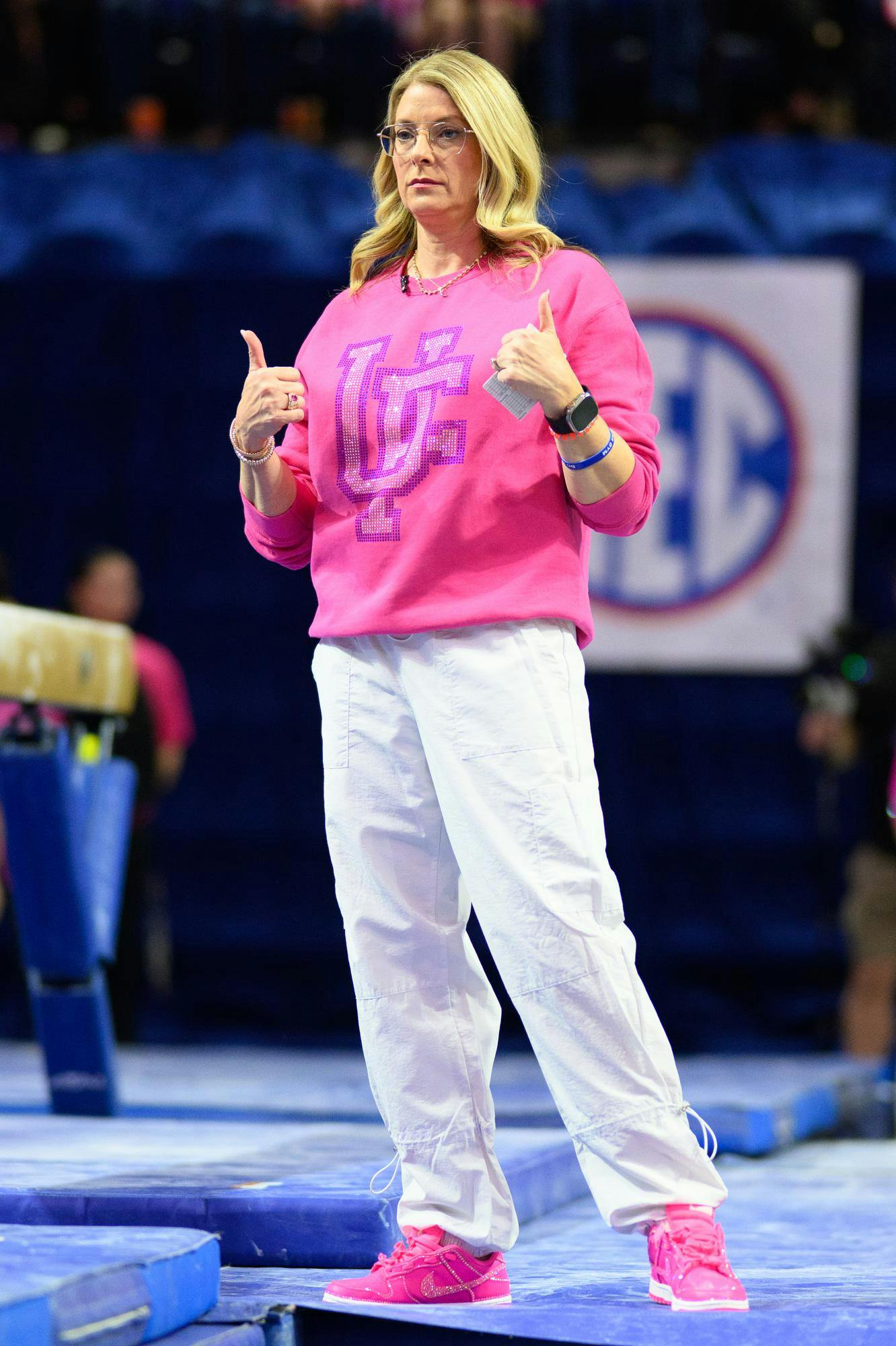 Florida head coach Jenny Rowland watches her team before the beam during an NCAA gymnastics meet against Oklahoma, Friday, Feb. 13, 2026, in Gainesville, Fla.