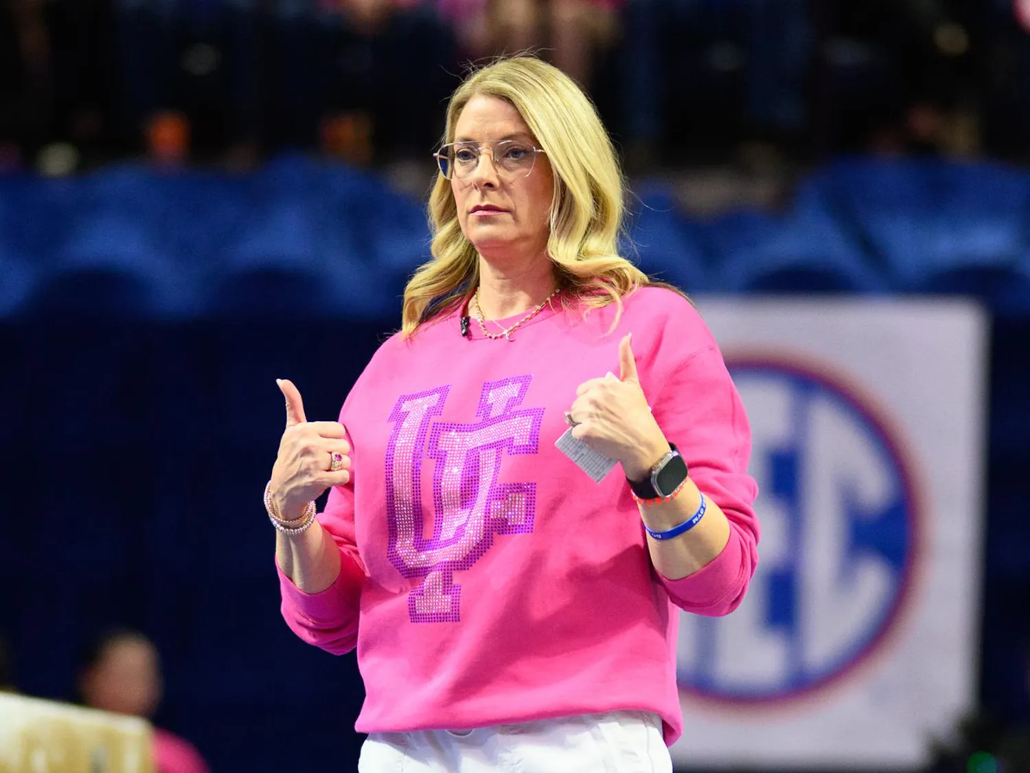 Florida head coach Jenny Rowland watches her team before the beam during an NCAA gymnastics meet against Oklahoma, Friday, Feb. 13, 2026, in Gainesville, Fla.