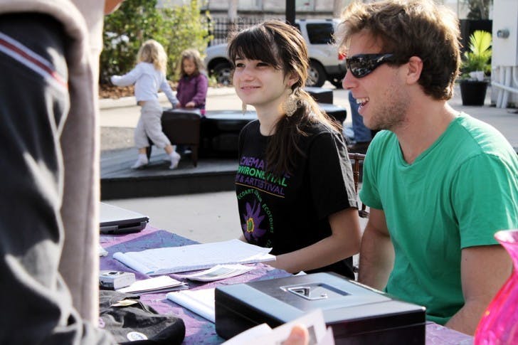 Nineteen-year-old political science sophomore Lissette Portocarrero and 21-year-old economics junior Matt Gorstein sell admission tickets for the 3rd annual Cinema Verde Environmental Film and Arts Festival. The festival runs from Feb. 24 to March 2, featuring films that focus on environmental issues and hosting local booths that showcase ways patrons can get involved within their own community.