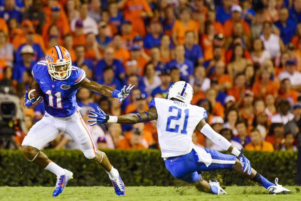 Wide receiver Demarcus Robinson caught 15 passes for 216 yards and two touchdowns during Florida&#x27;s 36-30 triple-overtime win over the Kentucky Wildcats Saturday, Sept. 13, 2014. 
