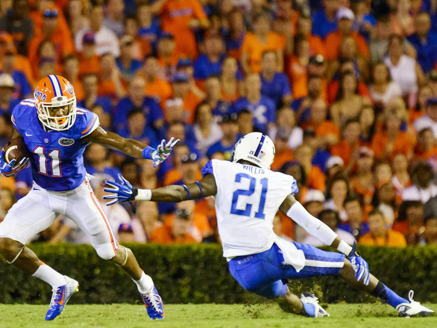 Wide receiver Demarcus Robinson caught 15 passes for 216 yards and two touchdowns during Florida&#x27;s 36-30 triple-overtime win over the Kentucky Wildcats Saturday, Sept. 13, 2014. 