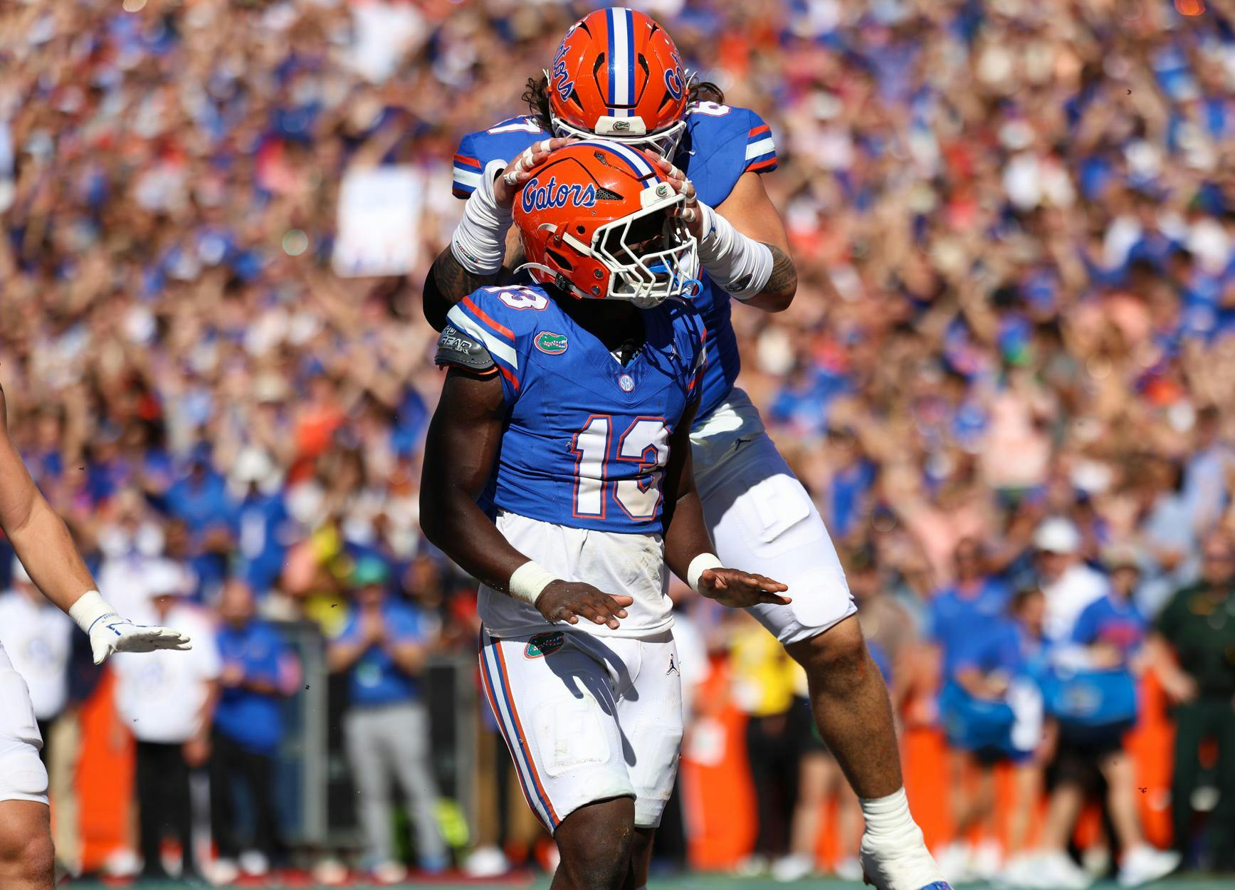 Florida running back Jadan Baugh (13) celebrates a touchdown during an NCAA college football game against Ole Miss, Saturday, Sept. 26, 2026, in Gainesville, Fla.