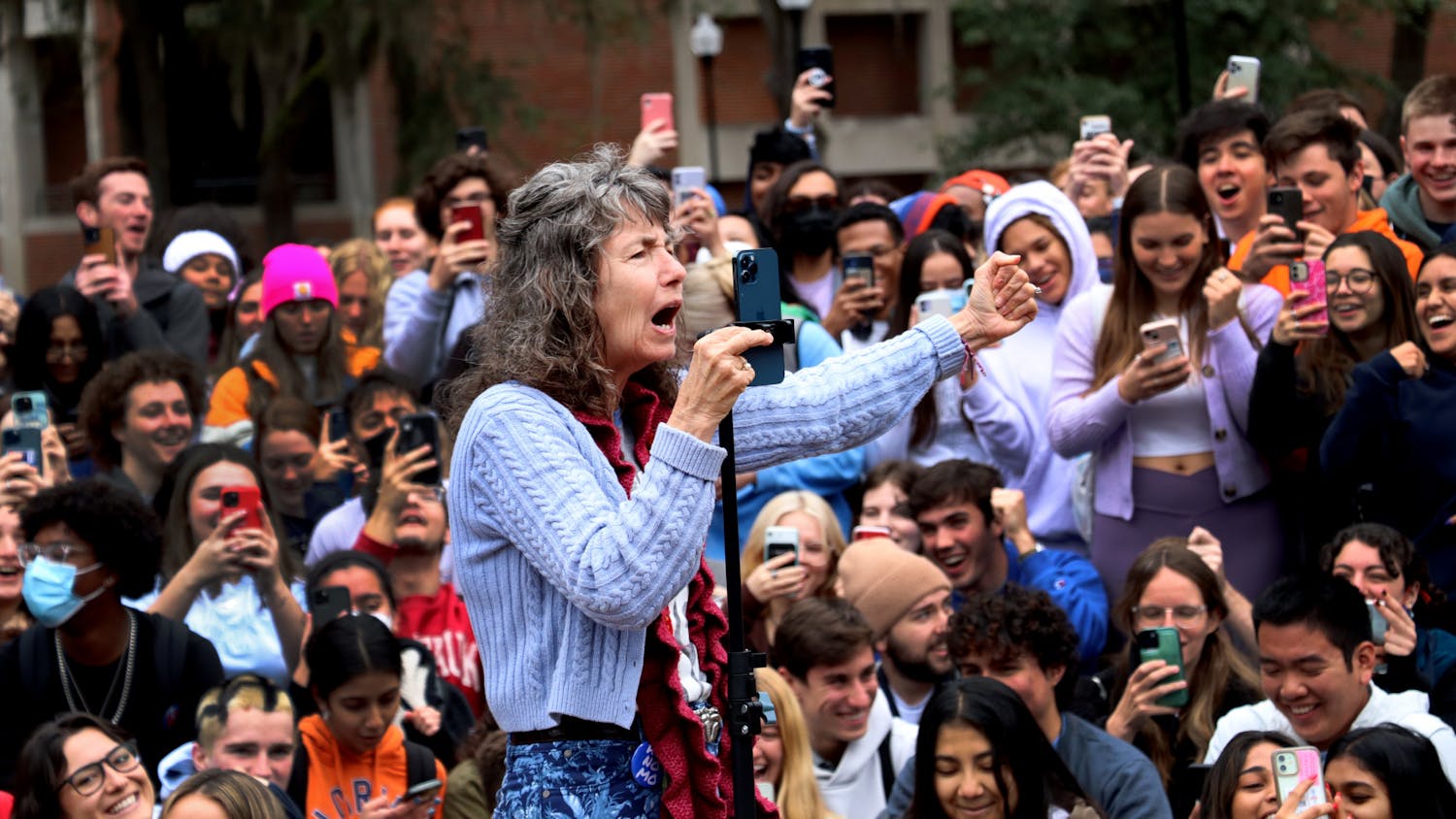 Cindy Lasseter Smock, also known as Sister Cindy, rallies up a crowd of over 500 at Plaza of the Americas on Monday, Feb. 7. Smock, who has amassed over 360 thousand TikTok followers, is famous for traveling across the U.S. and proselytizing. 