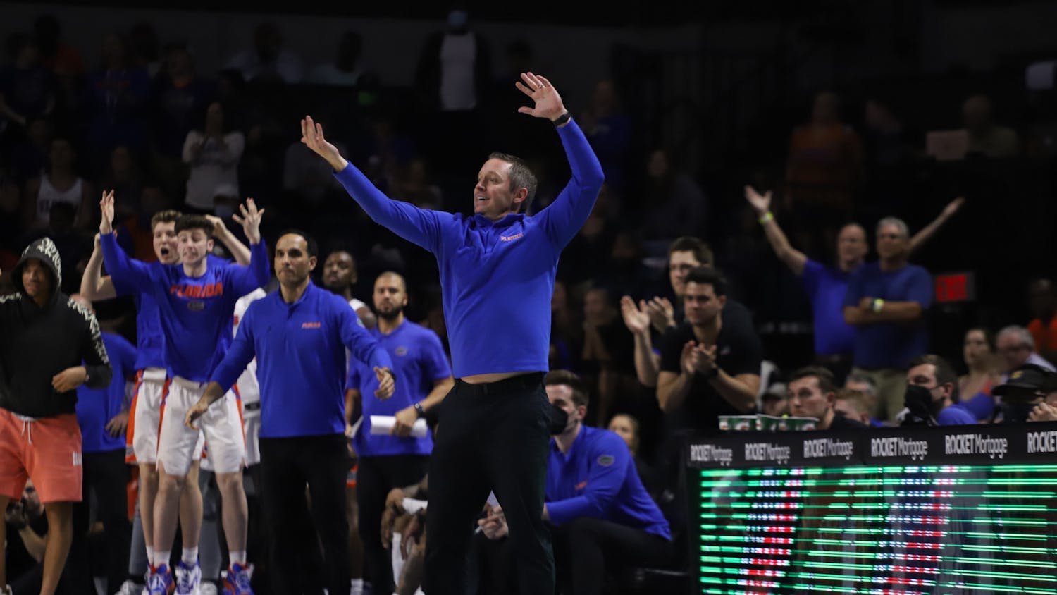 Gators head coach Mike White sends signals to his team during a Feb. 22 matchup with Arkansas. Florida lost in the second round of the SEC tournament 