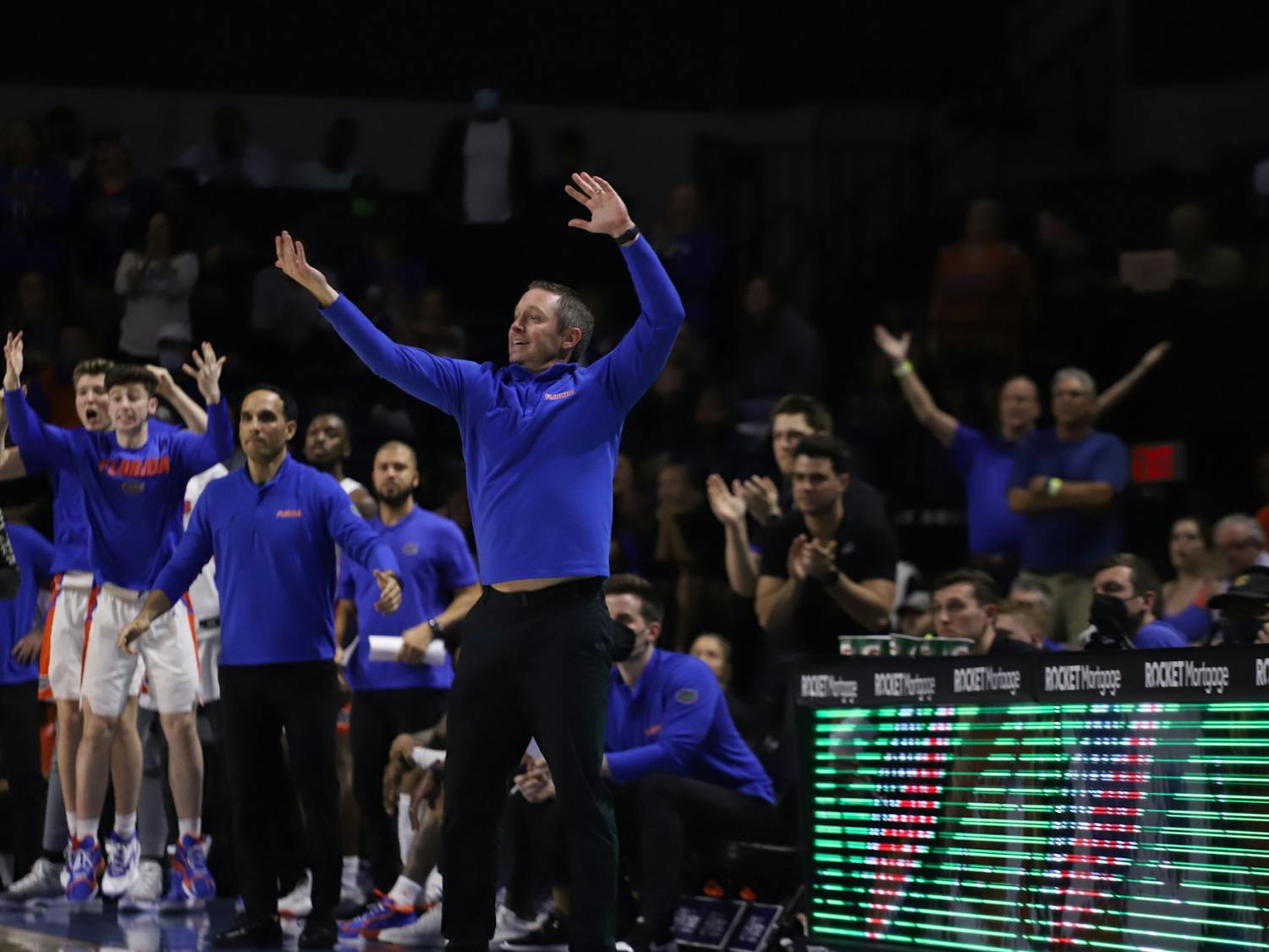 Gators head coach Mike White sends signals to his team during a Feb. 22 matchup with Arkansas. Florida lost in the second round of the SEC tournament 