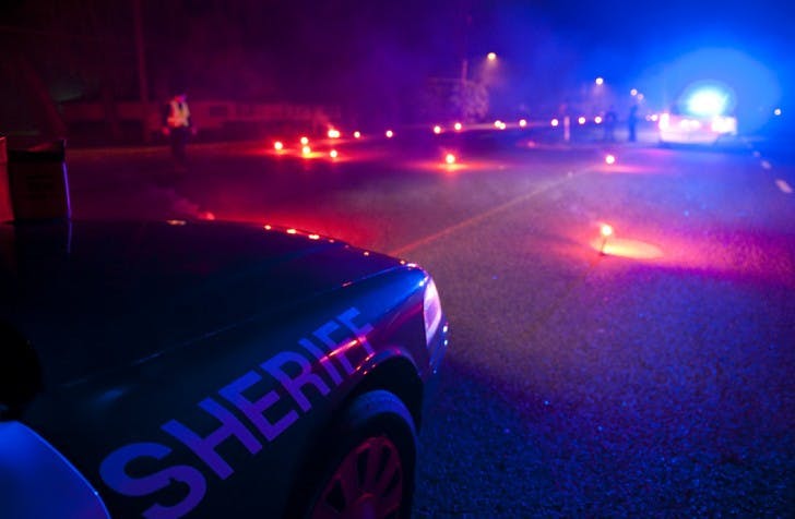 Flares burn on U.S. 441 near Southwest 63rd Avenue as Alachua Country Sheriffs turn away southbound travelers shortly after midnight Sunday. Heavy smoke from a fire on Paynes Prairie combined with heavy fog caused multiple-car wrecks on both U.S. 441 and Interstate 75.