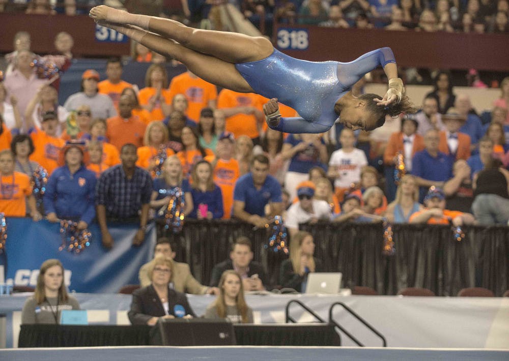 <p>Florida senior all-arounder Kytra Hunter performs her floor routine where she scored 9.975 during the 2015 NCAA gymnastics championships on Saturday, April 18, 2015 in Fort Worth, Texas.</p>