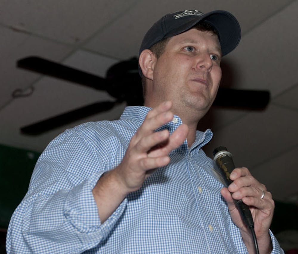 <p>Lauren Poe speaks at Mother's Pub on Thursday about his candidacy for Gainesville's At-Large 1 seat in the 2012 election.</p>