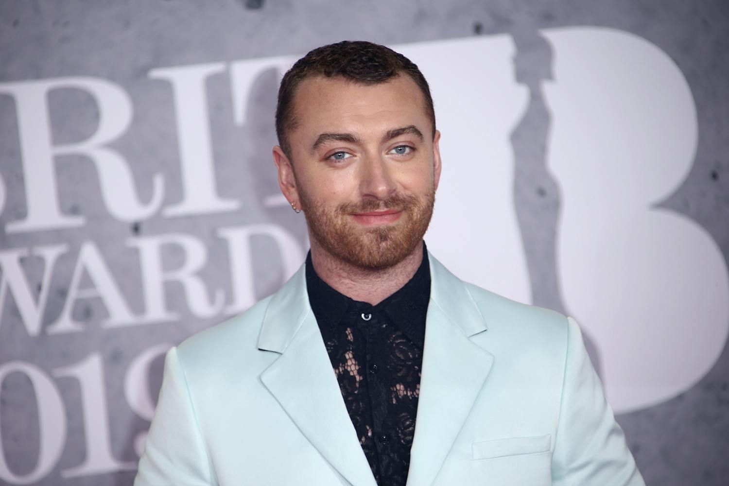 This Feb. 20, 2019, file photo shows singer Sam Smith posing for photographers upon arrival at the Brit Awards in London. The Oscar-winning pop star has declared his pronouns “they/them” on social media after coming out as non-binary in his “lifetime of being at war with my gender.” The English “Too Good at Goodbyes” singer said Friday, Sept. 13, 2019, he’s decided to “embrace myself for who I am, inside and out ...” (Photo by Joel C Ryan/Invision/AP, File)