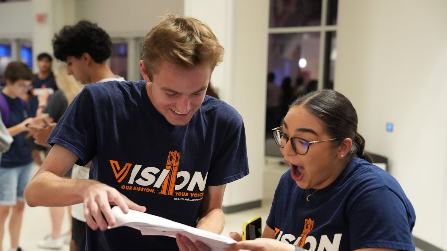 Members of Vision Party look over the election results in the J. Wayne Reitz Union Student Union Reitz Student Union on Wednesday, Oct. 4, 2023. 