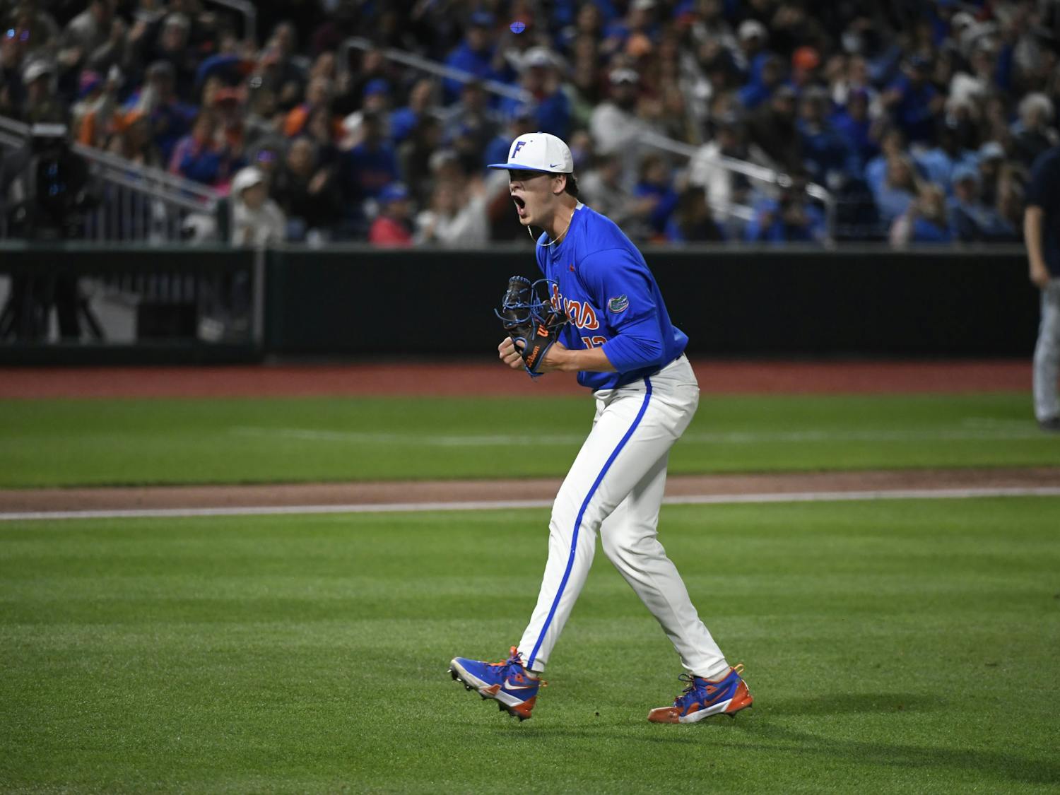 Florida baseball freshman right-handed pitcher Liam Peterson shows emotion after escaping a jam in the fourth inning of the team's game against Columbia University on Saturday, February 24, 2024. 