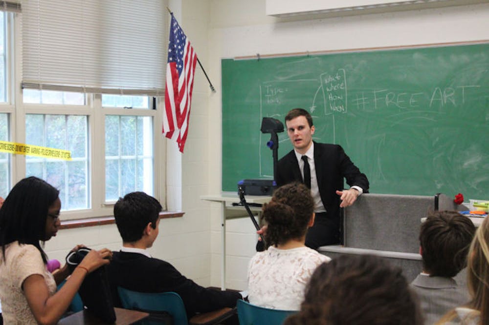 <p dir="ltr">Chris Joyce, a 22-year-old political science senior, speaks to the League of Extraordinary Gentlemen Sunday morning in Matherly Hall. The crisis committee was part of the 11th annual Gator Model United Nations Conference.</p>