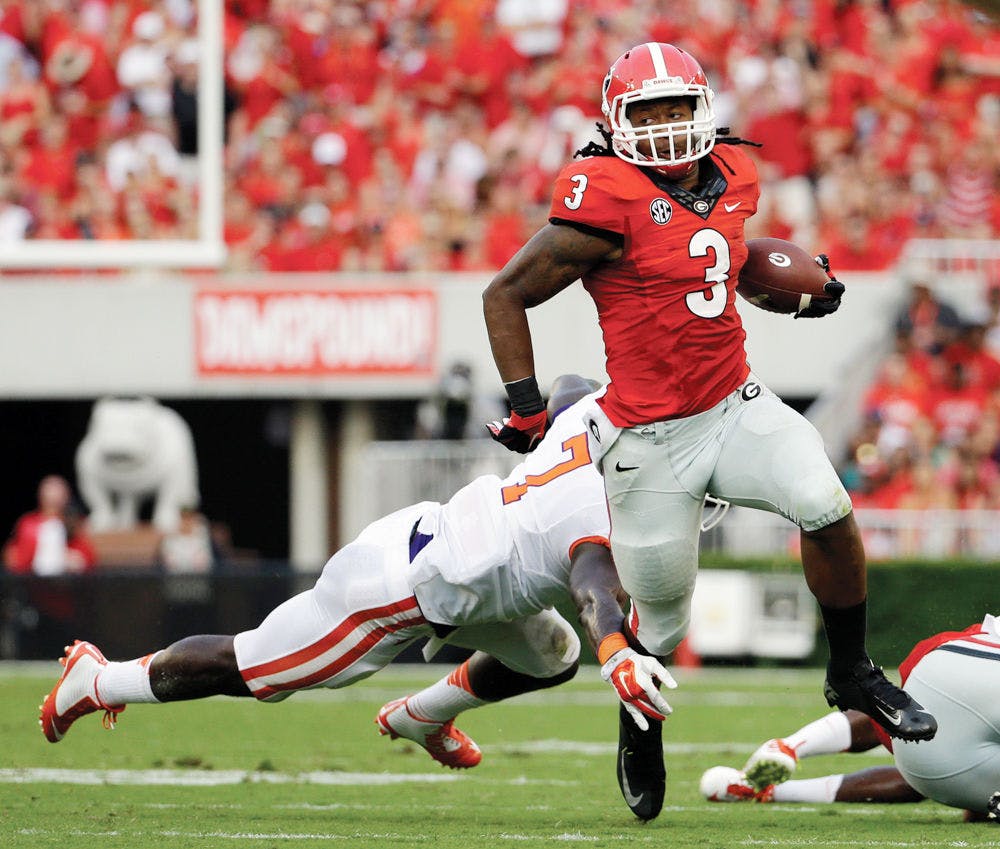 <p>UGA's Todd Gurley rushes during Georgia's 45-21 win against Clemson on Aug. 30 in Athens, Ga.</p>