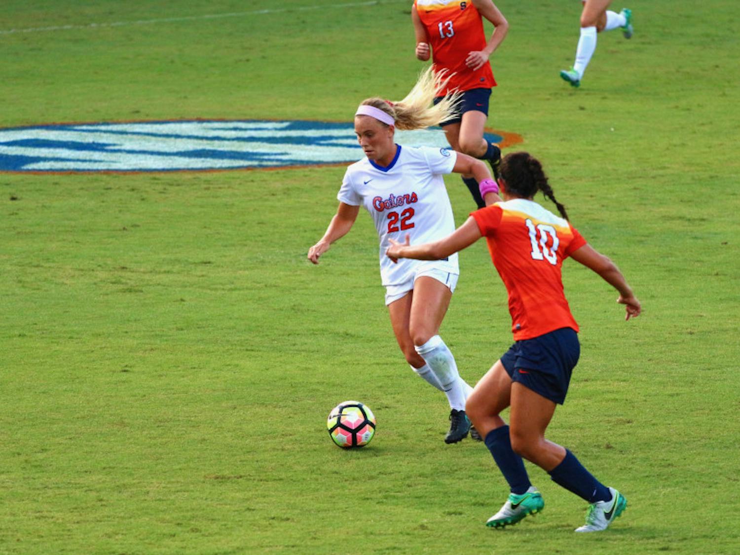 Parker Roberts dribbles the ball during Florida's 2-1 win against Syracuse on August 27, at Donald R. Dizney Stadium.