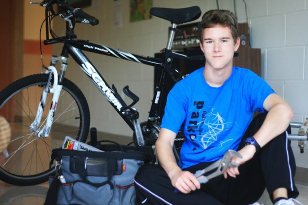 <p>Corey Nickels, an 18-year-old electrical engineering sophomore, fixes and donates abandoned bicycles.</p>