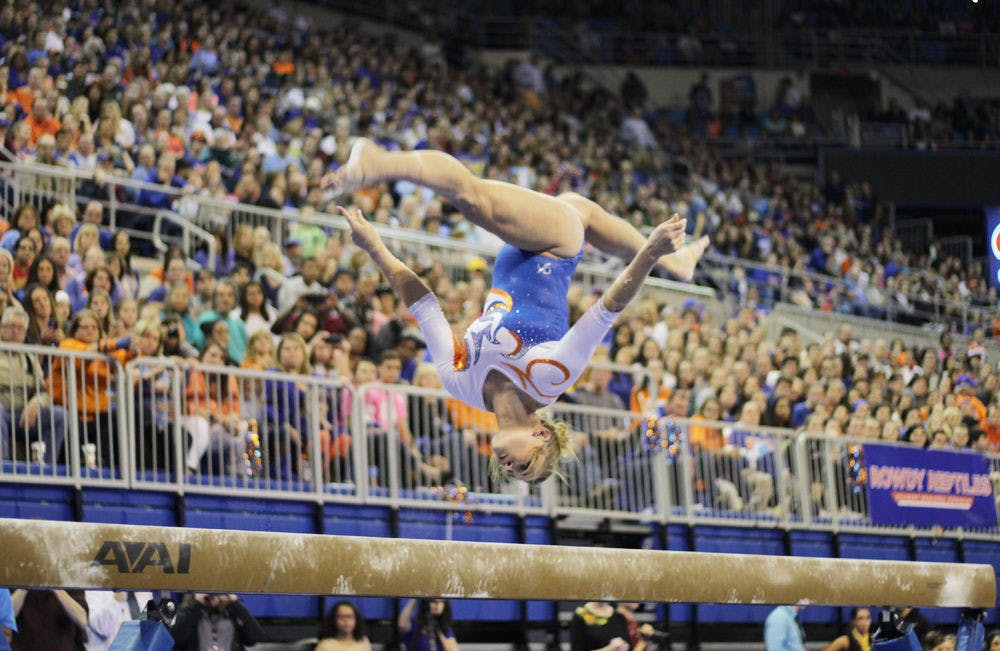 <p>Bridget Sloan performs on the balance beam during Florida's win against Alabama on Jan. 29, 2016, in the O'Connell Center.</p>