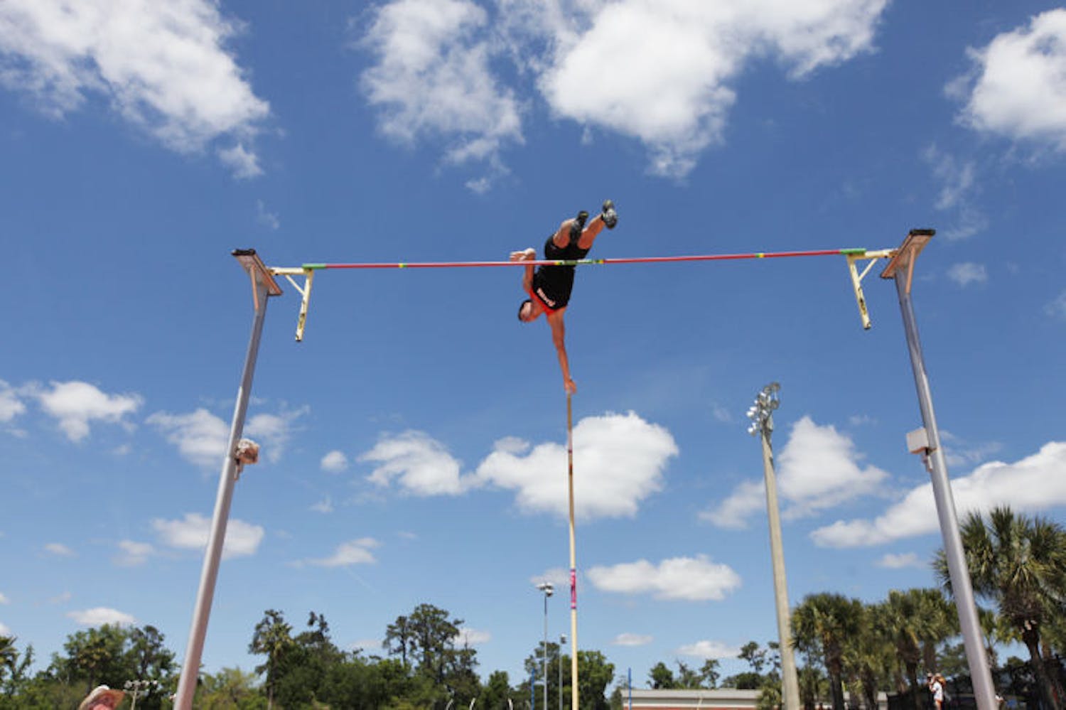 Senior Max Lang attempts to clear the pole during the Florida Relays on Saturday at Percy Beard Track at James G. Pressly Stadium. Lang tied for 20th in the men’s university division.