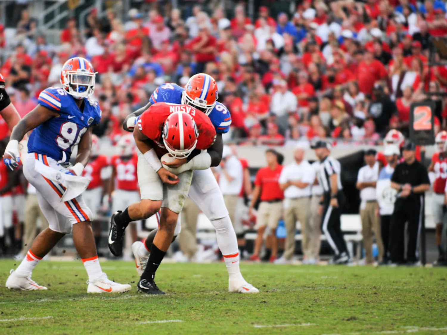 Bryan Cox tackles Georgia quarterback Jacob Eason during Florida's 24-10 win over UGA on Oct. 29, 2016, in Jacksonville.