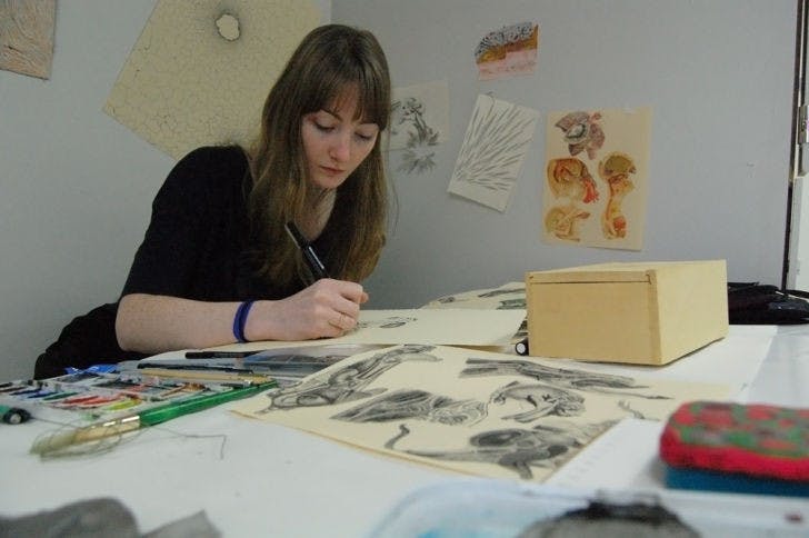 Lily King, a 21-year-old UF drawing senior, draws anatomical figures she saw in various medical textbooks. She uses a micron pen to illustrate her mad scientist collages, and her work “Contained” will be featured in Friday’s exhibition.&nbsp;