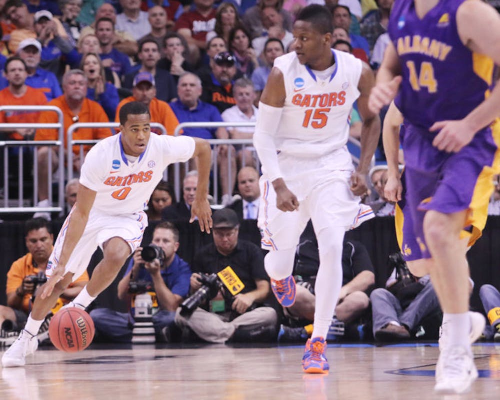 <p>Kasey Hill drives down the court during Florida’s 67-55 win against Albany in the in the Amway Center in Orlando on Thursday. Hill scored 10 points in the second-round game of the NCAA Tournament against the Great Danes.</p>
