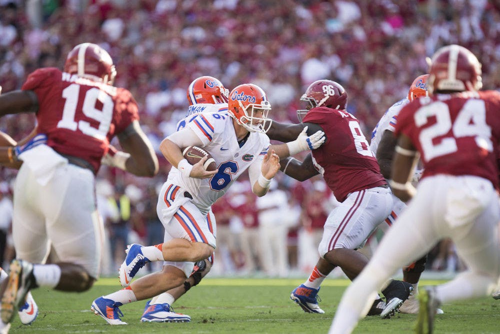Jeff Driskel rushes during Florida's 42-21 loss to Alabama on Sept. 20 at Bryant-Denny Stadium.