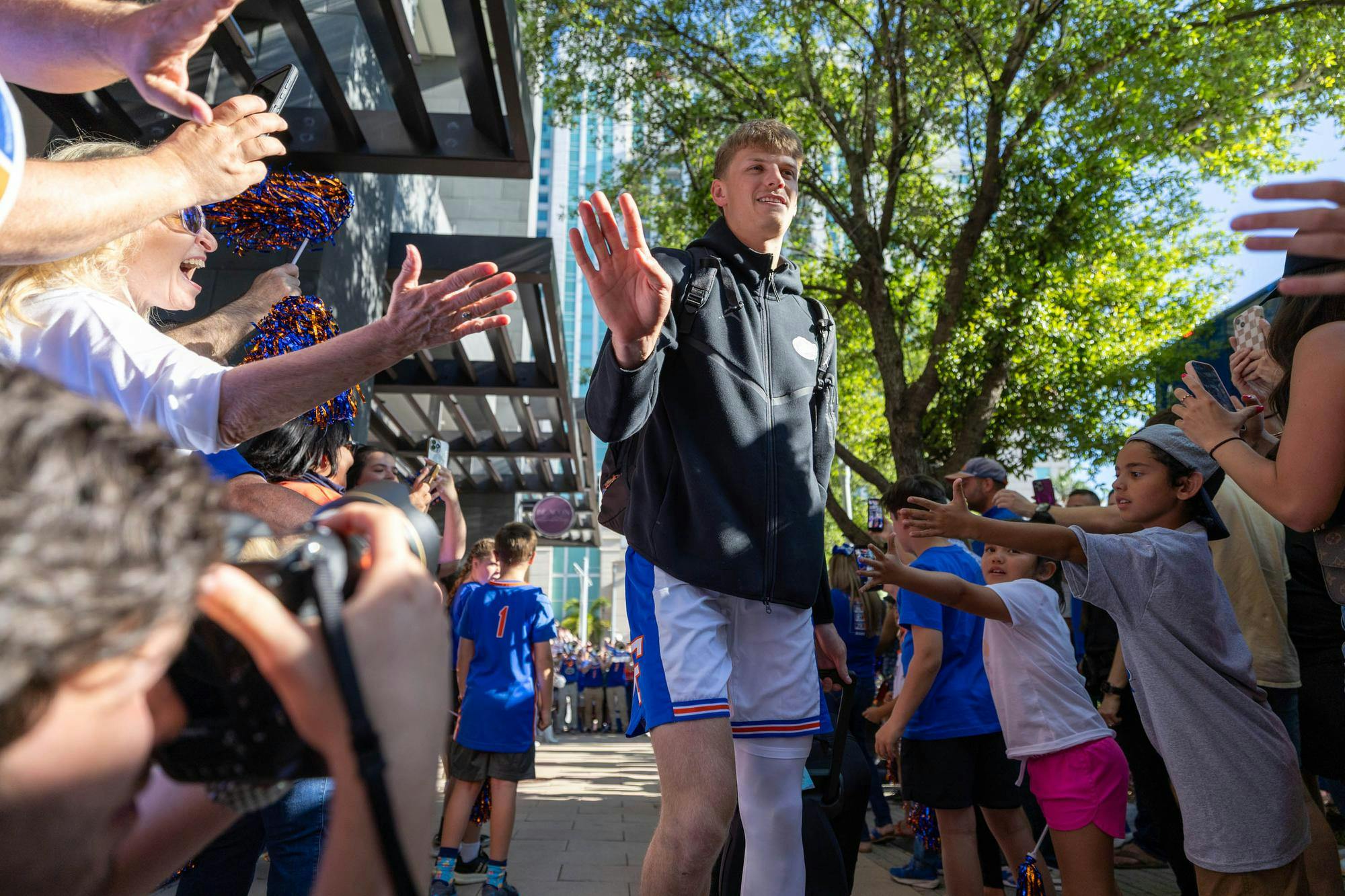 Florida forward Thomas Haugh walks through GatorWalk, Sunday, March 22, 2026, in front of the JW Marriott, in Tampa, Fla.