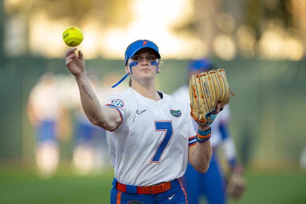 Florida Gators pitcher Keagan Rothrock (7) throws the ball before a softball game against the Jacksonville Dolphins in Gainesville, Fla., on Tuesday, Feb. 11, 2025.