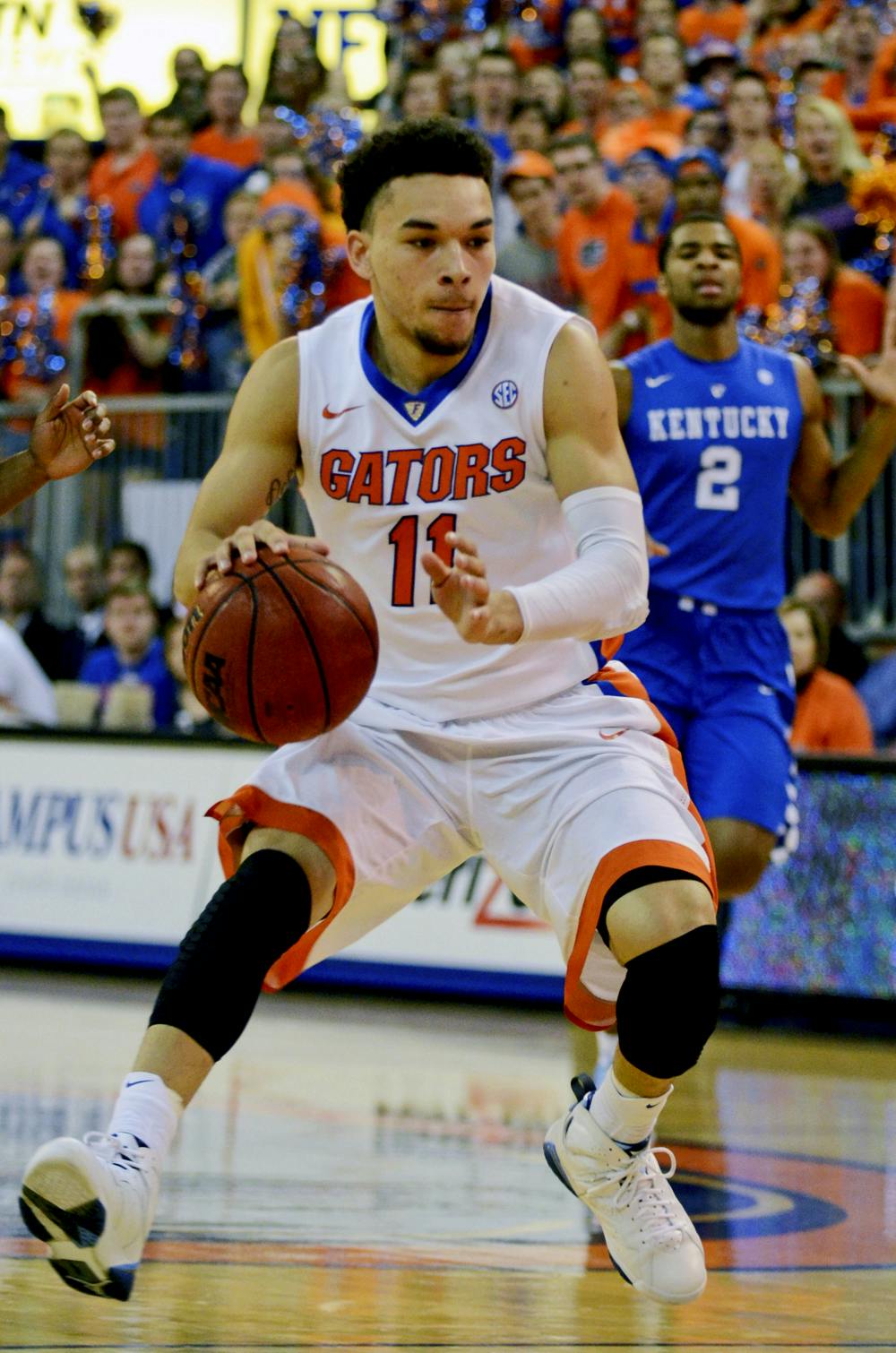 Chris Chiozza drives the ball into the paint during Florida's 68-61 loss to No. 1 Kentucky on Feb. 7, 2014 in the O'Connell Center.