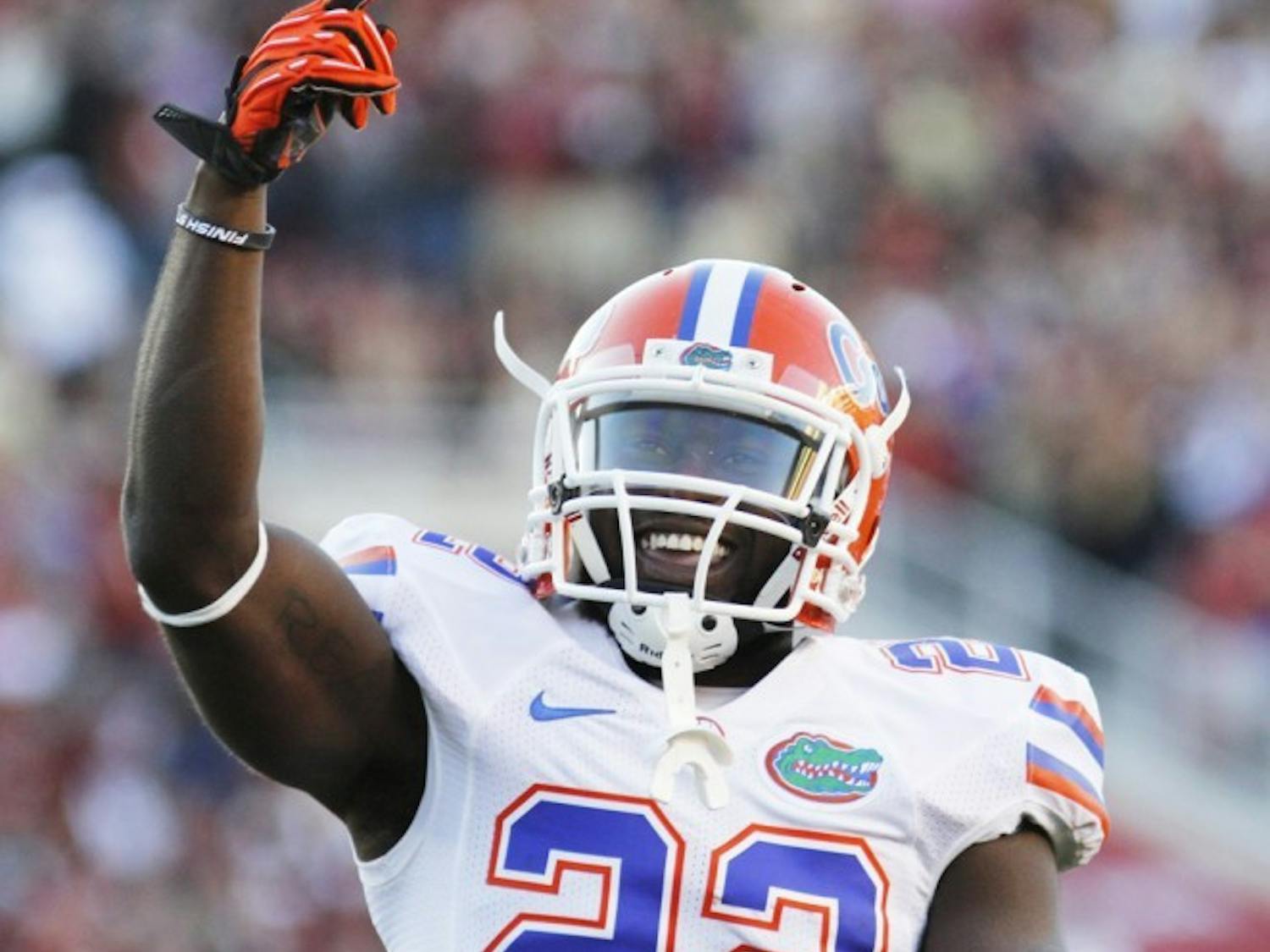 Safety Matt Elam celebrates after making a tackle in Florida’s 37-26 win against Florida State on Saturday at Doak Campbell Stadium in Tallahassee. 