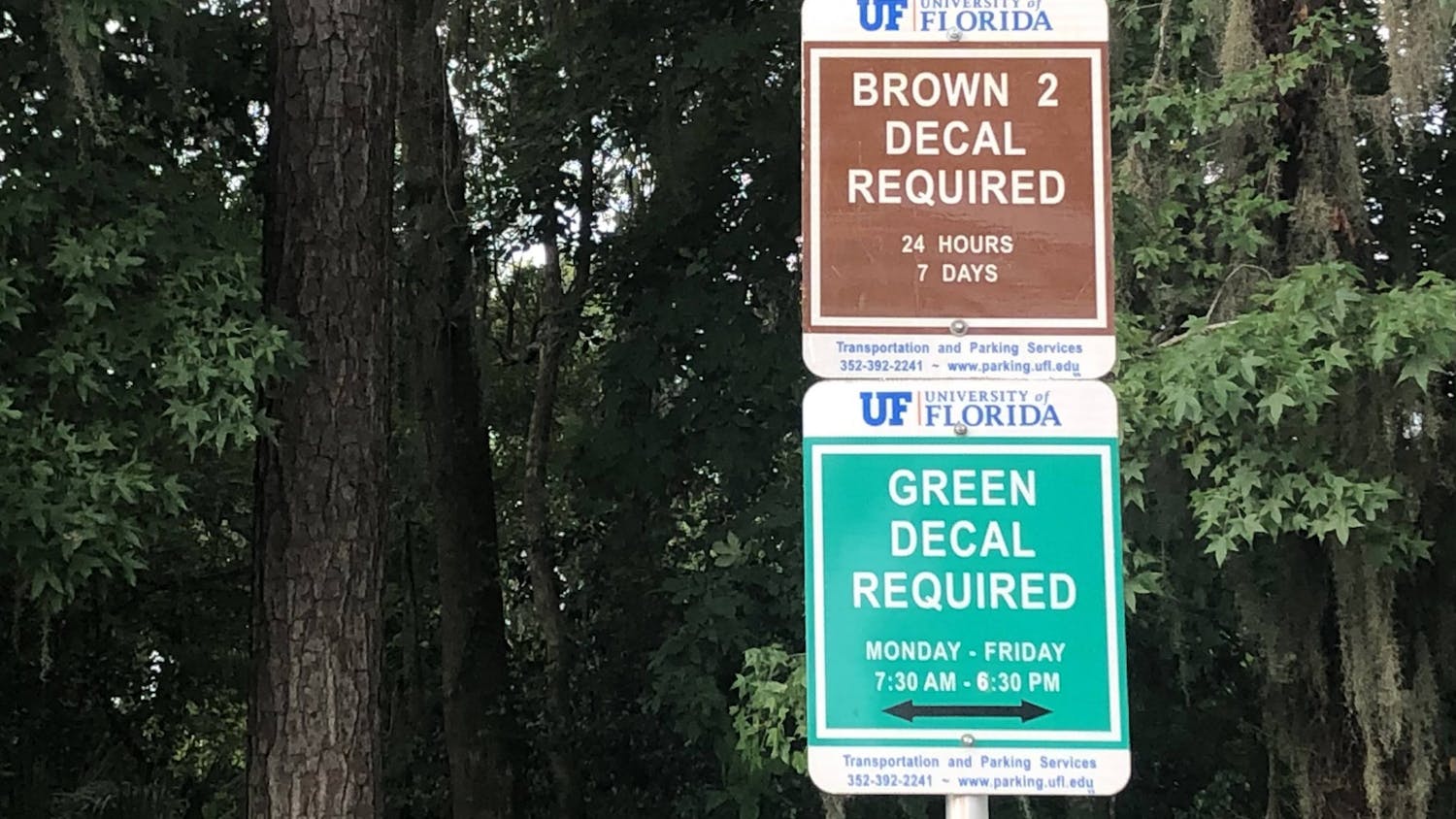 Graduates students are allowed to park with a green decal and students living in family housing are allowed to park with a brown decal as pictured Sunday, July 24, 2022.