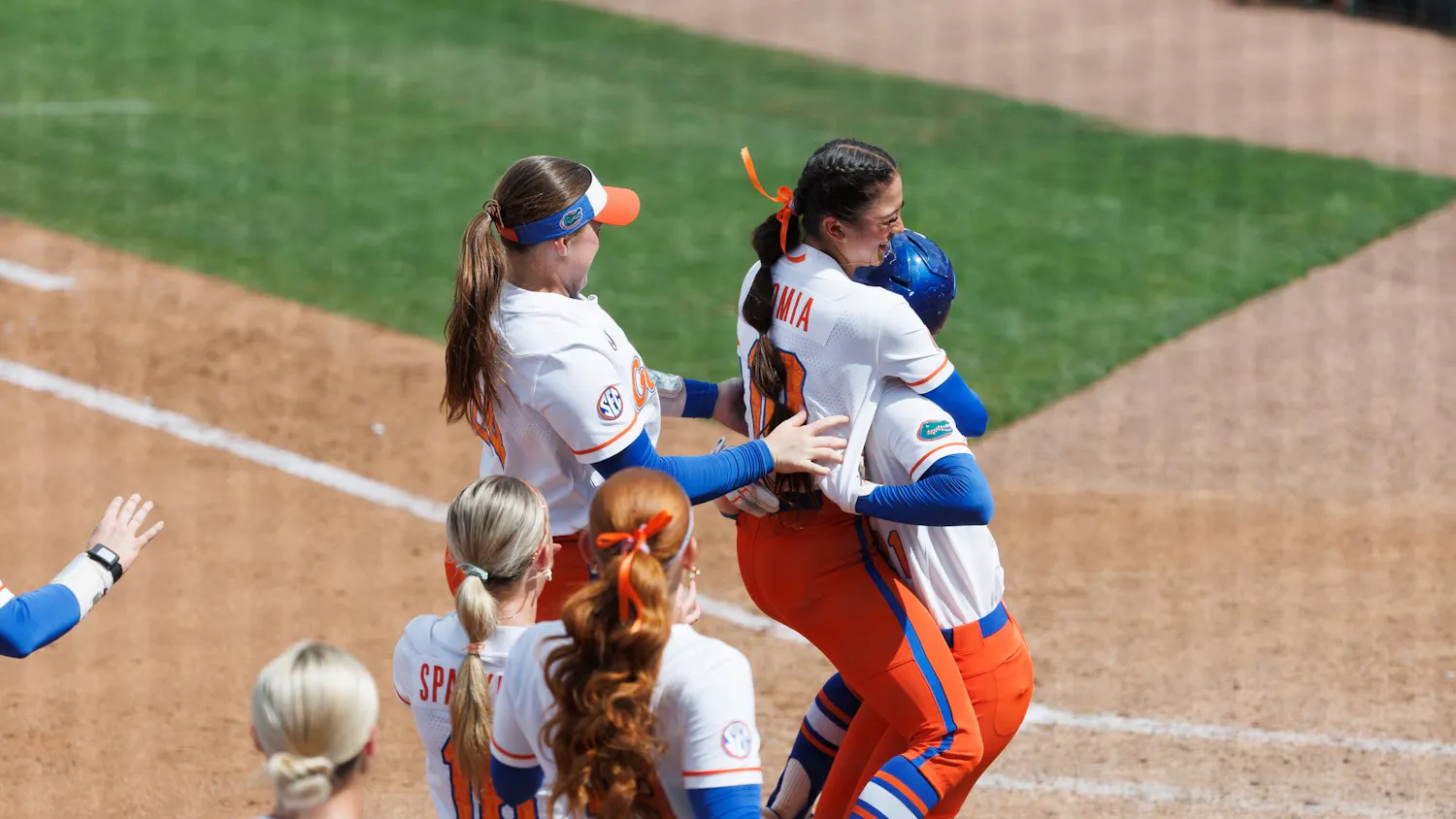 The Florida Gators softball team celebrates a walk off win of an NCAA softball game against Mississippi State, Sunday, April 5, 2026, in Gainesville, Fla.