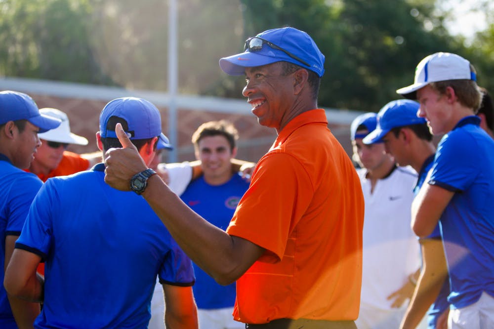 <p><span id="docs-internal-guid-cbd3192d-aabf-edac-e8e4-2be360e63f19"><span>UF men's tennis coach Bryan Shelton joins his team after its Senior Day match with Alabama on April 13. &nbsp;The Gators went 19-10 on the season and qualified for the NCAA Tournament.</span></span></p>