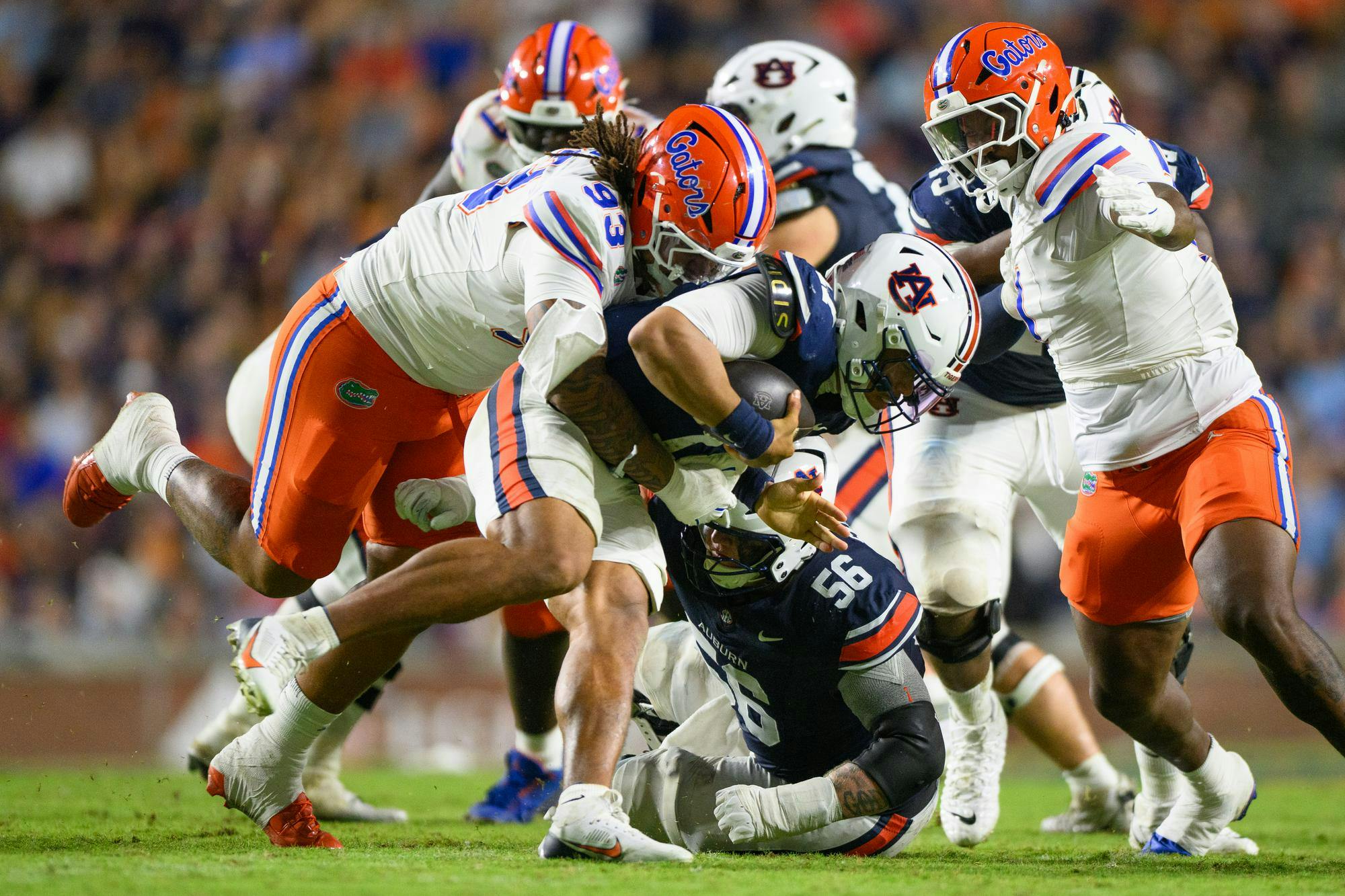 Florida defensive lineman DK Kalu (93) sacks Auburn quarterback Byrum Brown (17) during the second half of an NCAA college football game against Auburn, Saturday, Sept. 19, 2026, in Auburn, Ala.