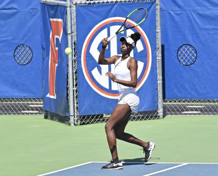 Marlee Zein completes a forehand return against Arkansas March 14