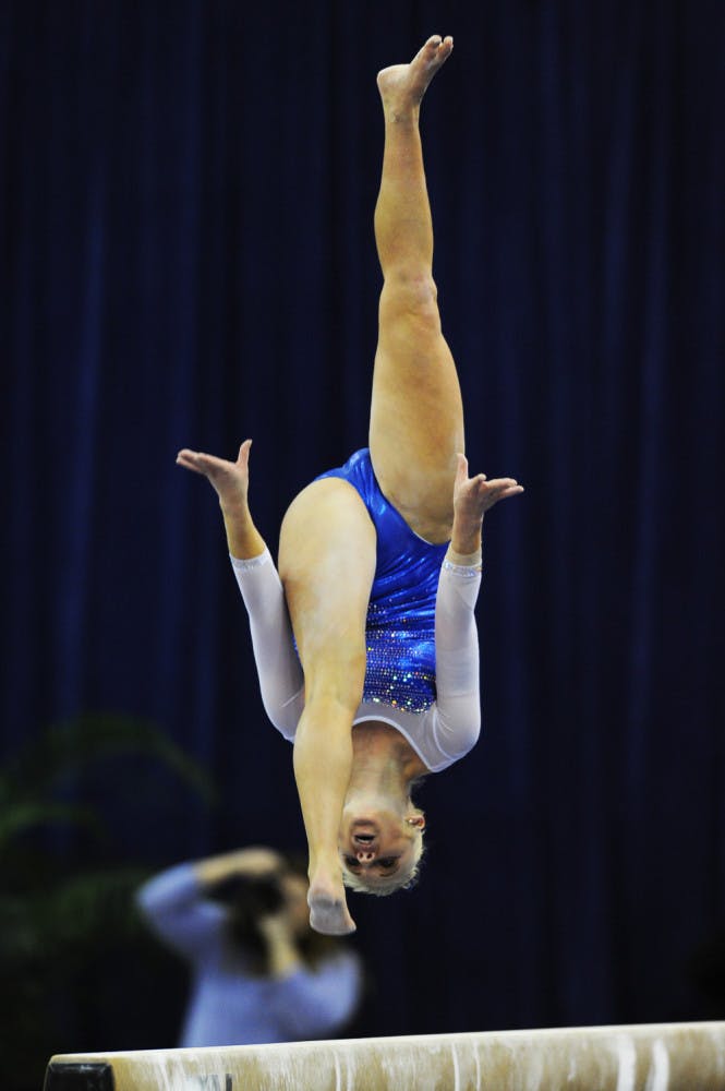 Rachel Spicer performs on the balance beam during Florida’s 198.05-196.70 home win over Georgia on Friday.