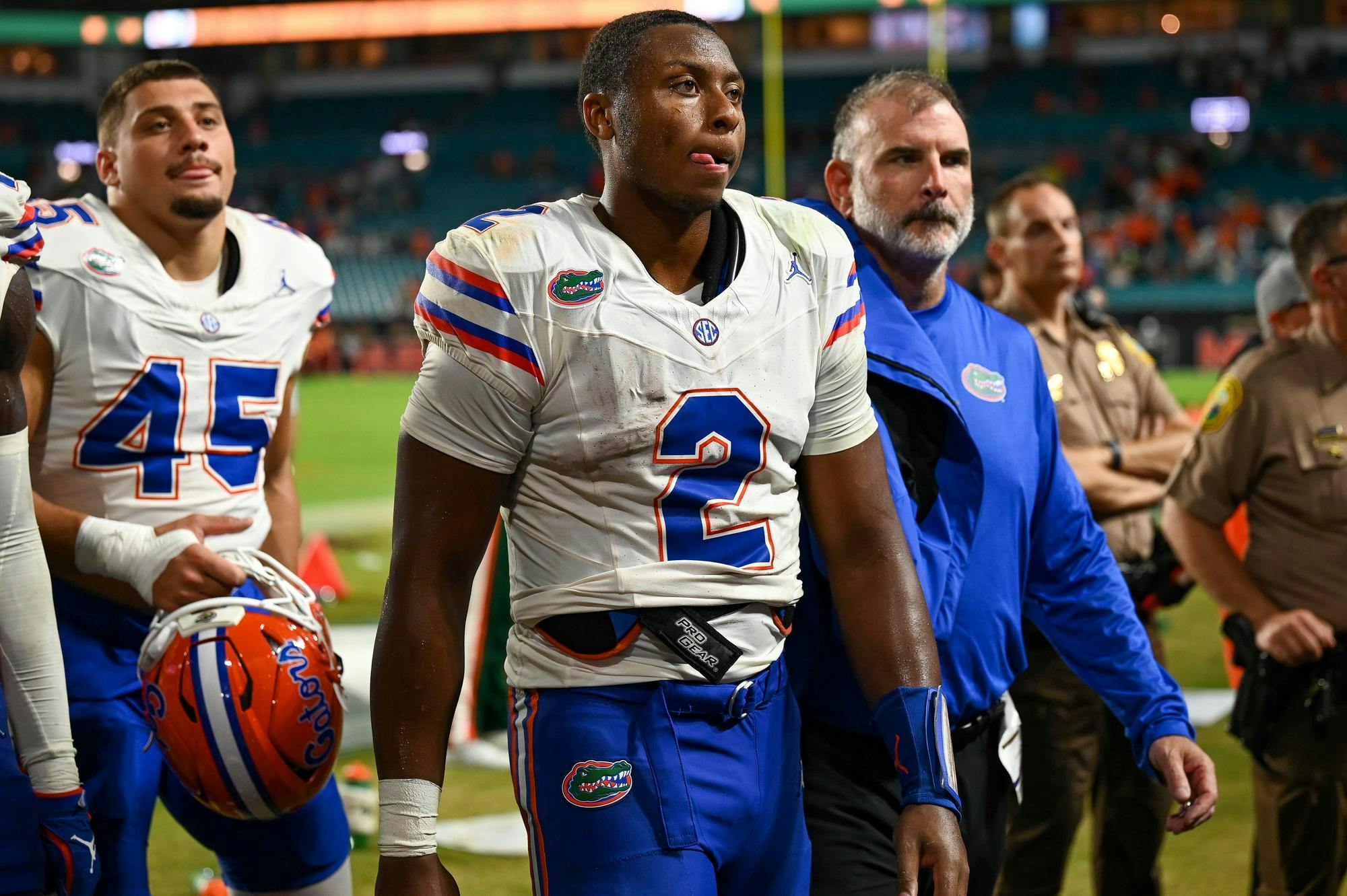 Florida Gators quarterback DJ Lagway (2) walks off the field after a loss in a football game between the Miami Hurricanes and the Florida Gators on Sept. 20, 2025, at Hard Rock Stadium in Miami Gardens, Fla.