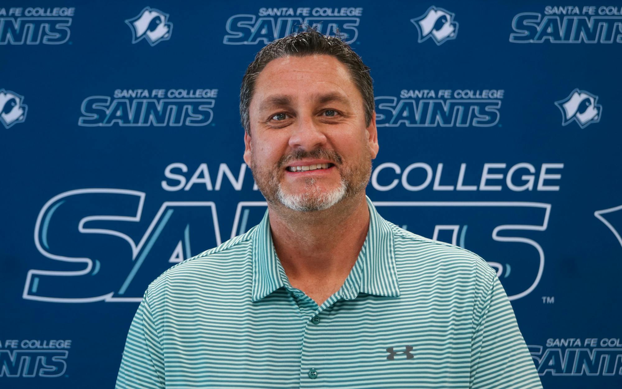 Santa Fe College's new athletic director, Greg McVey, 51, poses inside the school’s gym on Tuesday, June 1, 2021. McVey, who hails from the Midwest, said he's looking forward to working with "great people" and "great student athletes.