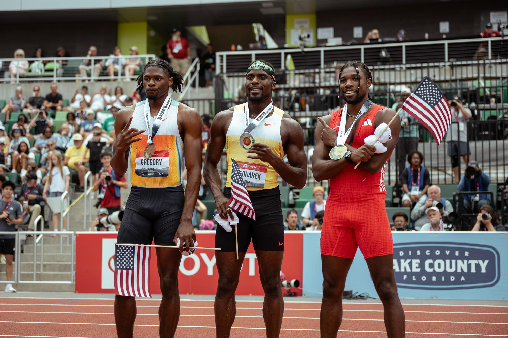 Florida track and field runner Robert Gregory (left) poses with his bronze medal alongside Kenny Bednarek and Noah Lyles. Photo courtesy of Johnny Zhang of CITIUS Mag.