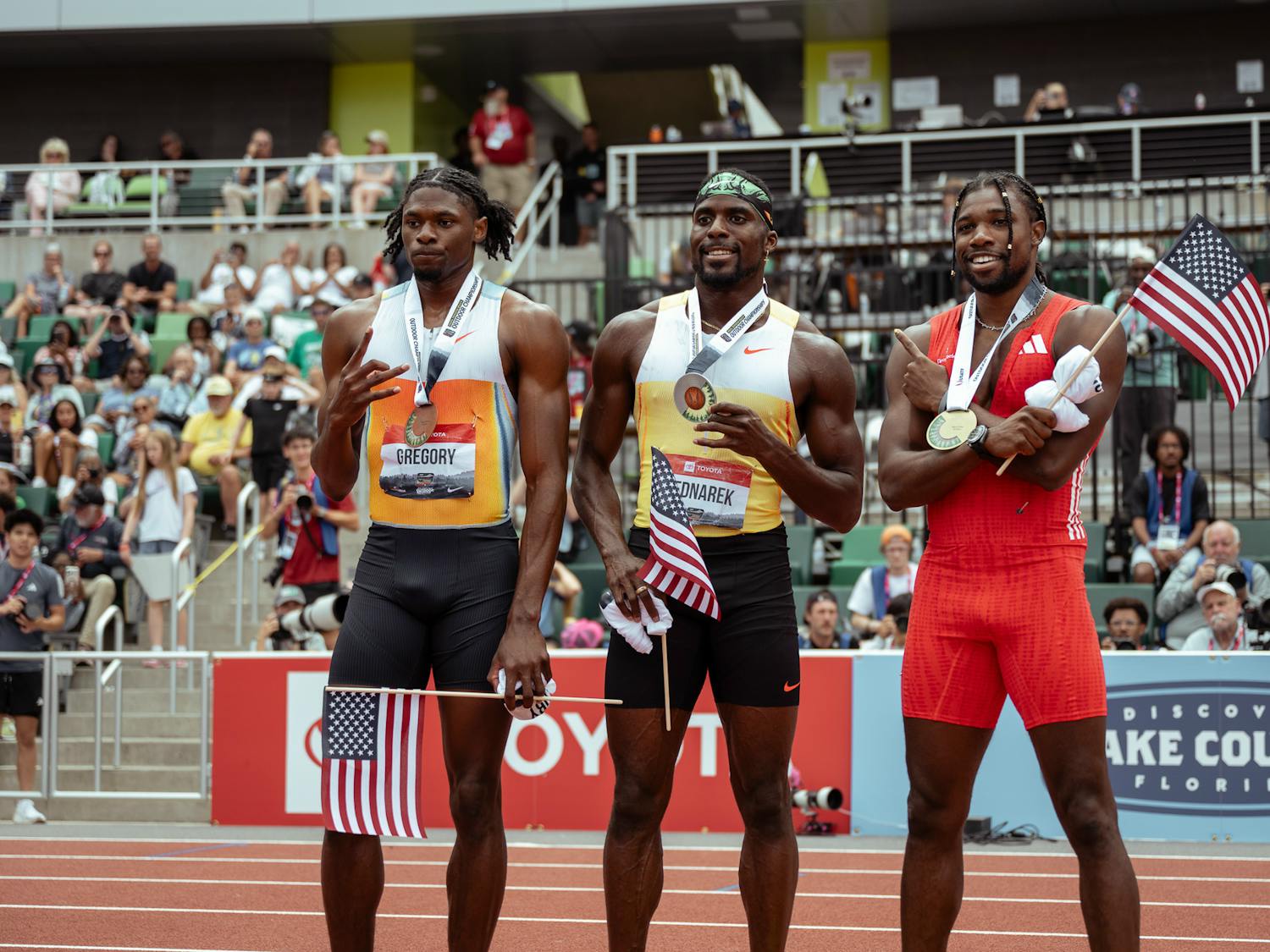 Florida track and field runner Robert Gregory (left) poses with his bronze medal alongside Kenny Bednarek and Noah Lyles. Photo courtesy of Johnny Zhang of CITIUS Mag.
